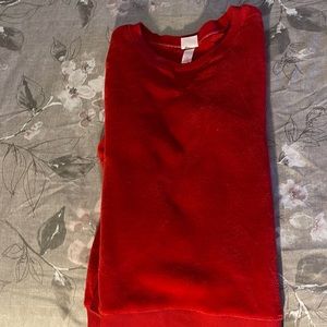 A red fuzzy sweater sleepwear, perfect for the winter and is super warm!